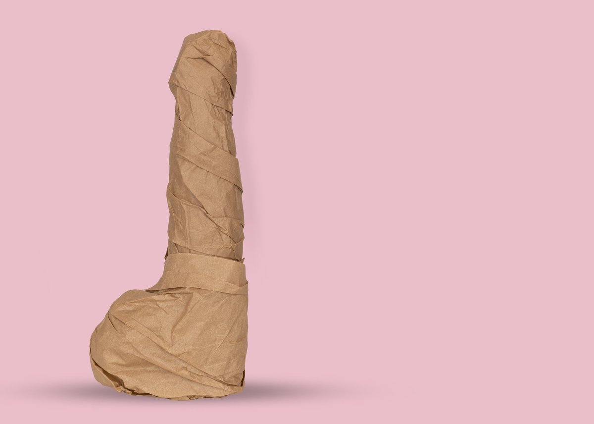 Minimalist dildo wrapped in kraft paper
